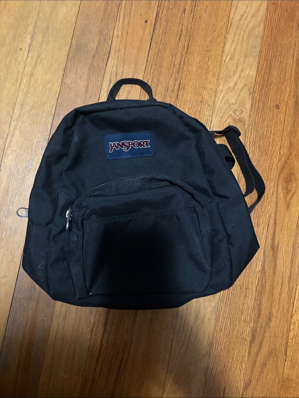 Jansport Half Pint Black Backpack with Front Zip Pocket